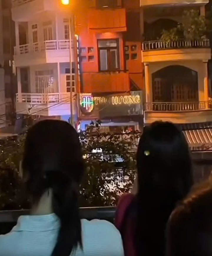 May be an image of one or more people and temple