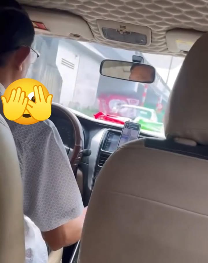 May be an image of rearview mirror and car