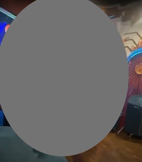 May be an image of dartboard