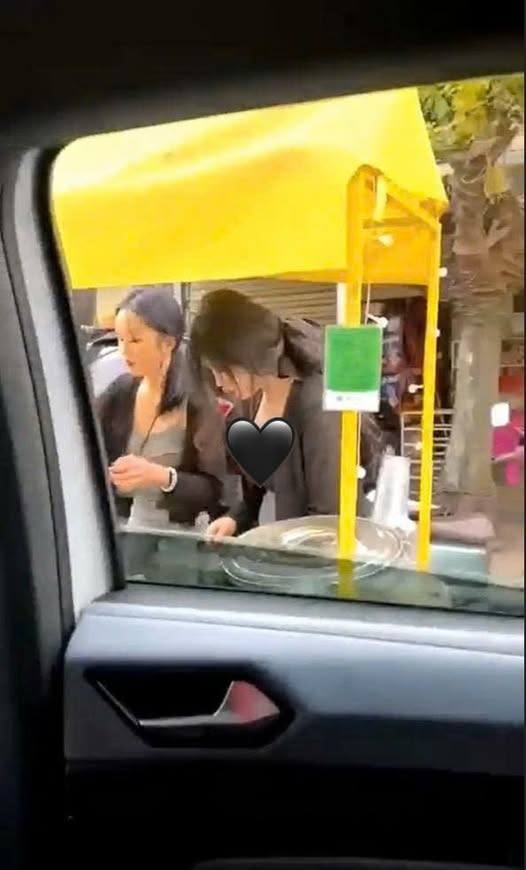 May be an image of one or more people, rearview mirror and parking meter