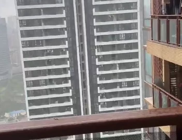 May be an image of skyscraper and Victoria Peak